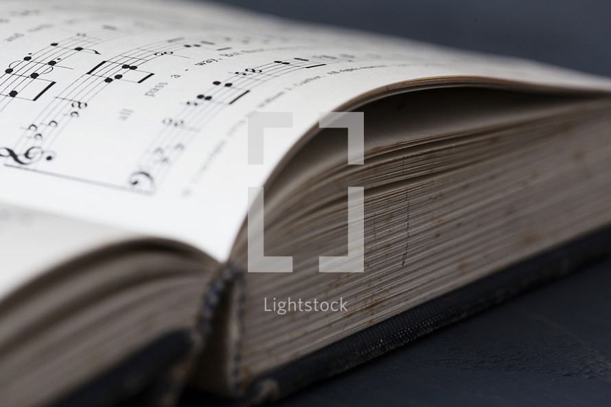 pages of an open hymnal 