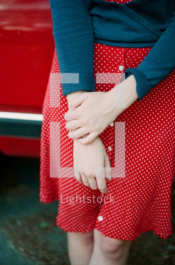 young woman in red skirt 