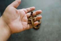 rosary in a hand 
