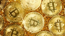 Bitcoin, crypto currency. Golden coins. Digital exchange, popularity of BTC, symbol of future money, electronics industry, mining concept. High quality photo