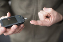 a diabetic monitoring blood sugar
