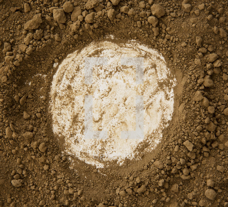 dirt background with dirty white circle in the middle. 