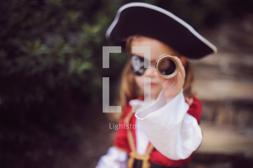 a child dressed up as a pirate 