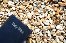 Holy Bible on gravel 