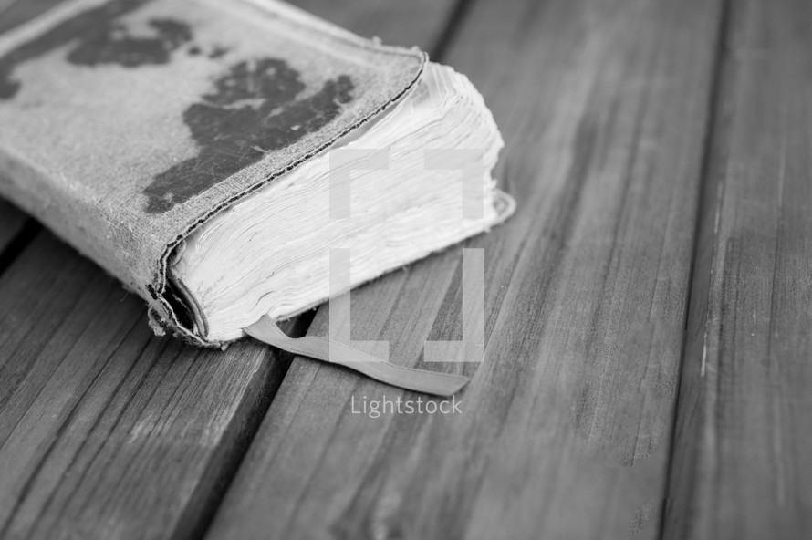 Bible on wood floor boards 