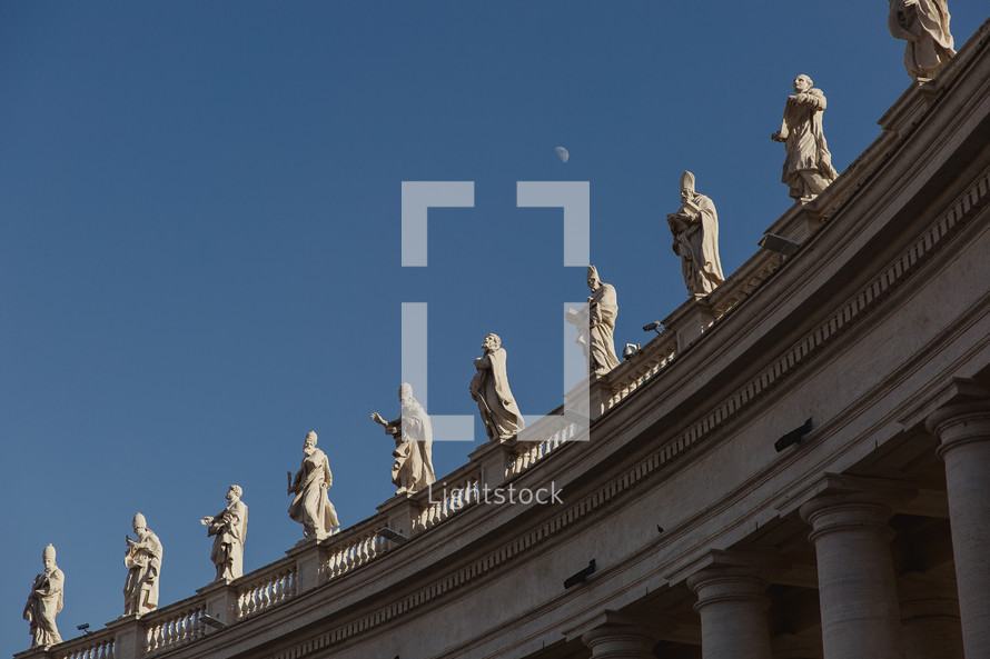 statues lining the roof in the Vatican 