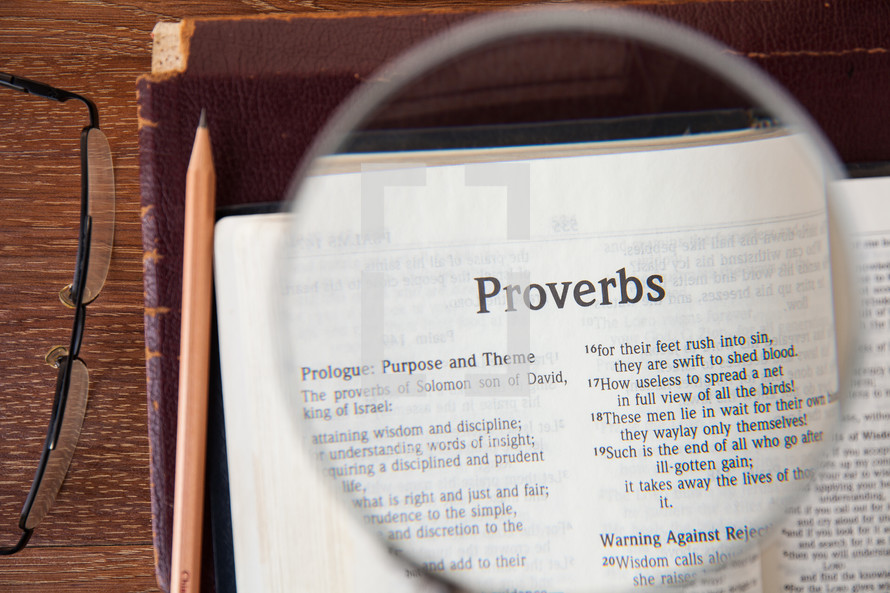 magnifying glass over Proverbs