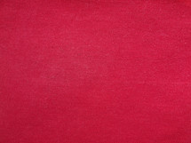 red fabric texture useful as a background