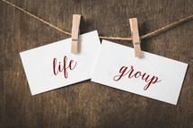 word life group on card stock hanging on twine by a clothespin 