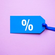 percentage sing on the blue price tag