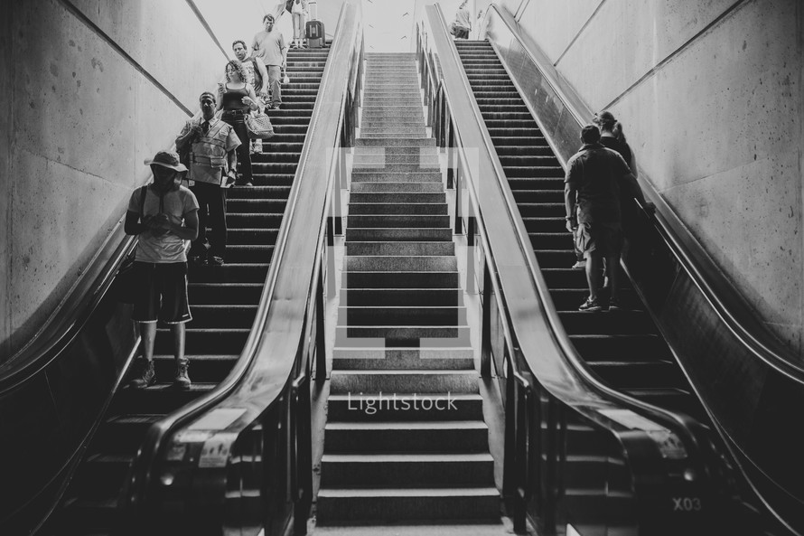 people on escalators 