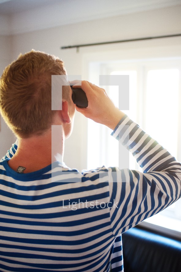 man with binoculars 