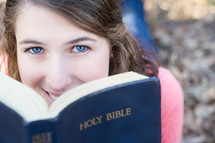teen girl reading the Bible