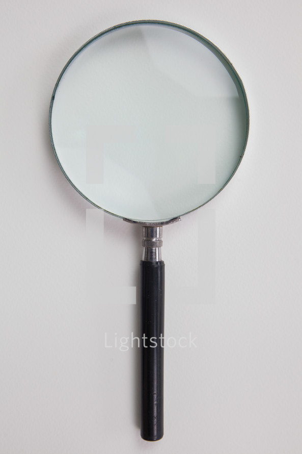 magnifying glass on white 