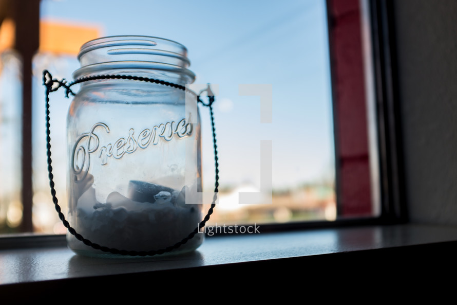 mason jar in a window 