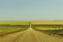 dirt road on a rural landscape 