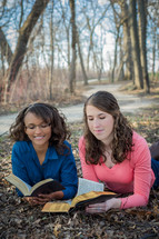 teen girls reading Bibles