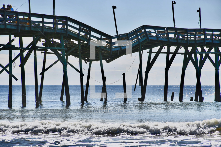 broken pier from hurricane damage at Ocean Isle Beach, NC