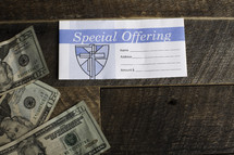 special offering envelope and cash 