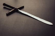 sword cross on gray background 