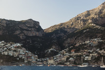 a coastal village along a slope in Italy 
