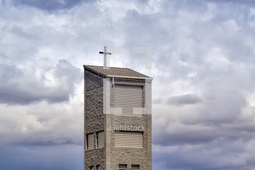 church steeple against a cloudy sky 