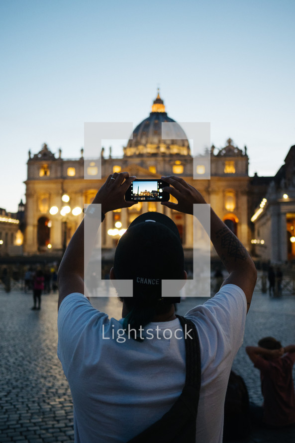 taking a picture of St, Peters Basilica 