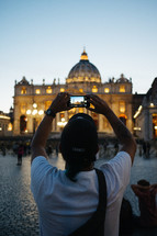 taking a picture of St, Peters Basilica 