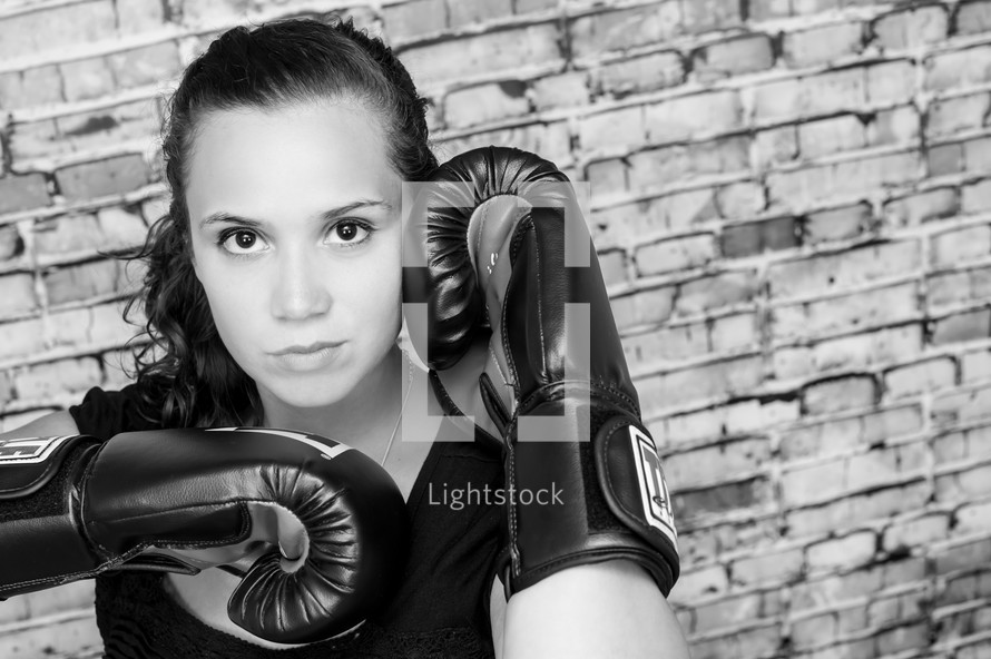 woman wearing boxing gloves 