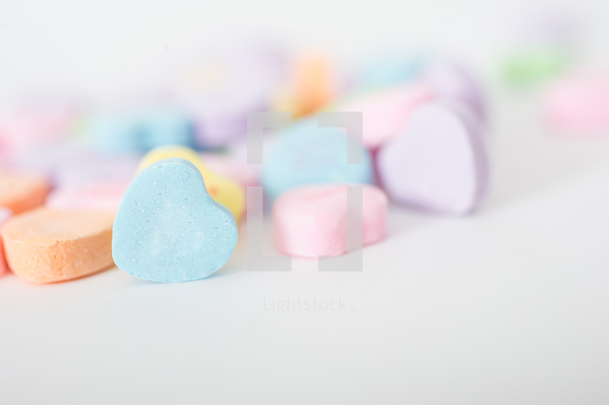 Pile of candy hearts.