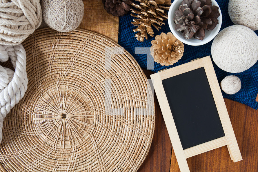straw mat, rope, twine, pinecones, chalkboard, place mats 