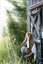 sunlight shinning on pregnant Mother Mary
