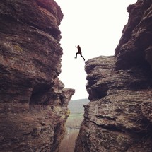 man taking a leap of faith