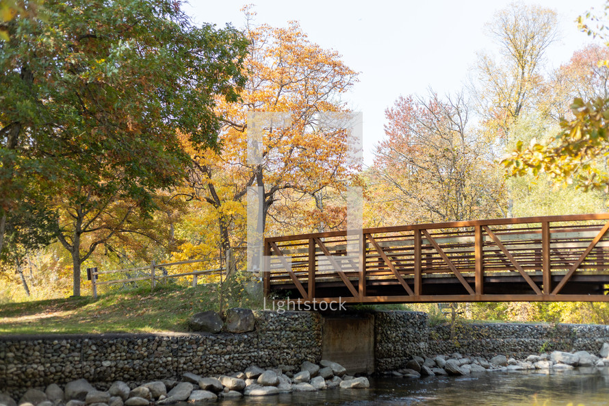 bridge over a river in fall 