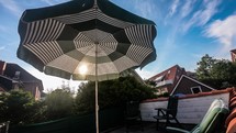 Timelapse under an umbrella on a sunny day