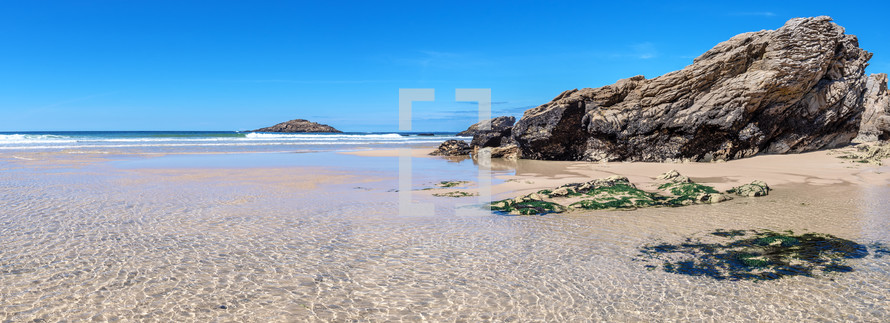 French landscape - Bretagne. A beautiful beach with rocks at low tide.
