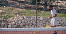 A tennis player hitting the ball during a tennis game