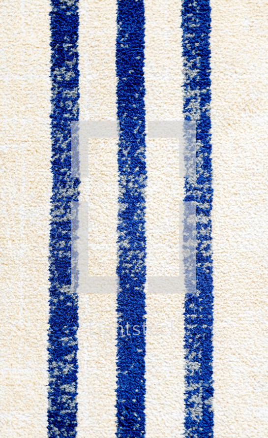 blue and white striped rug background 