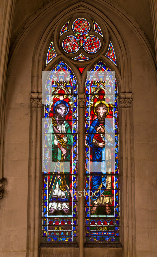 Biblical scenes on stained glass windows church