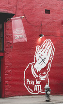 pray for all praying hands street art 