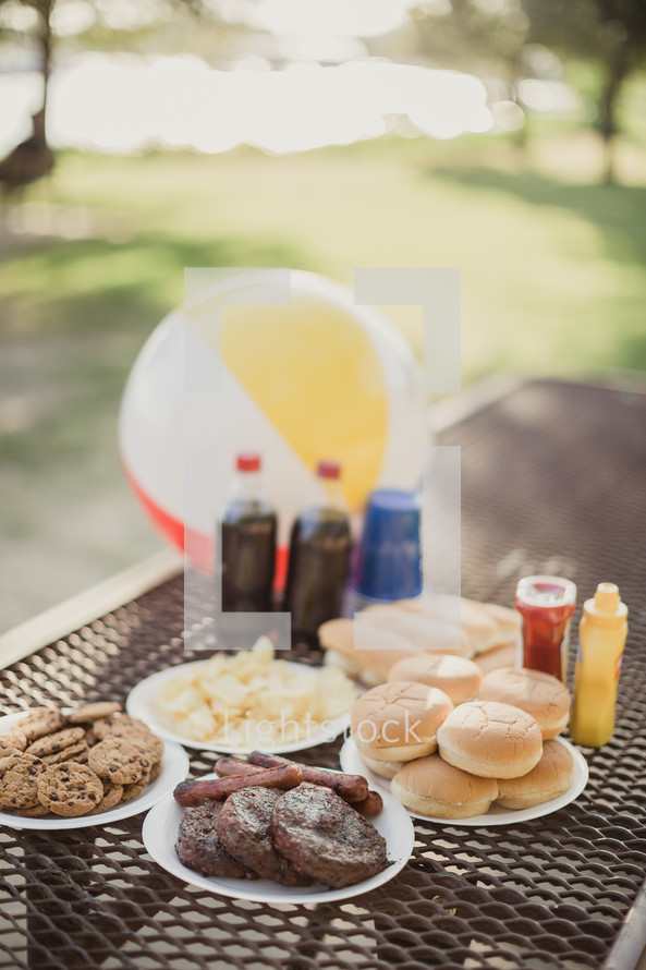 food on a picnic table outdoors 
