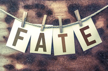 word fate on a clothesline 