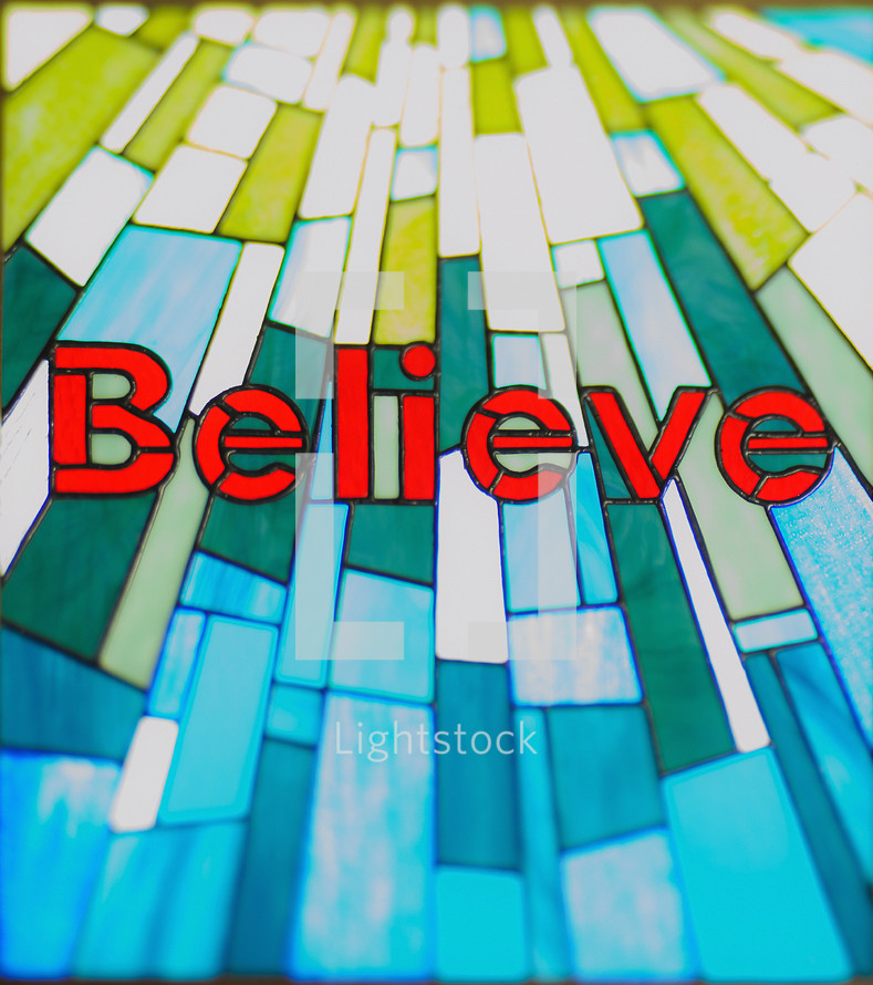 word believe in a stained glass window 