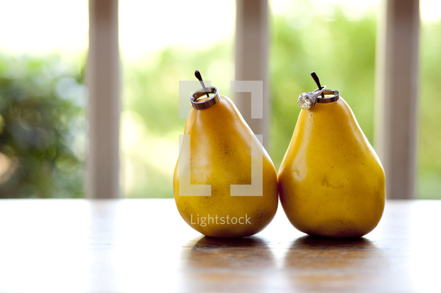 wedding rings on pears 