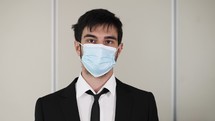 businessman in a face mask 