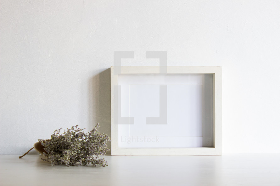 dried lavender and blank frame 
