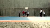 team basketball game outdoors 