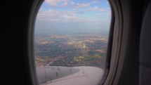 Sunset and Journey from the Airplane Window. Plane Flights Over Fluffy Clouds. Passenger window panorama view.