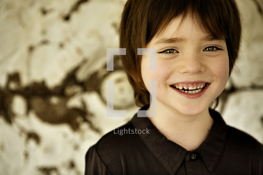 Happy little boy smiling