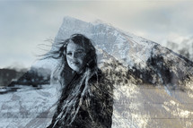portrait of a young woman and mountain peak 